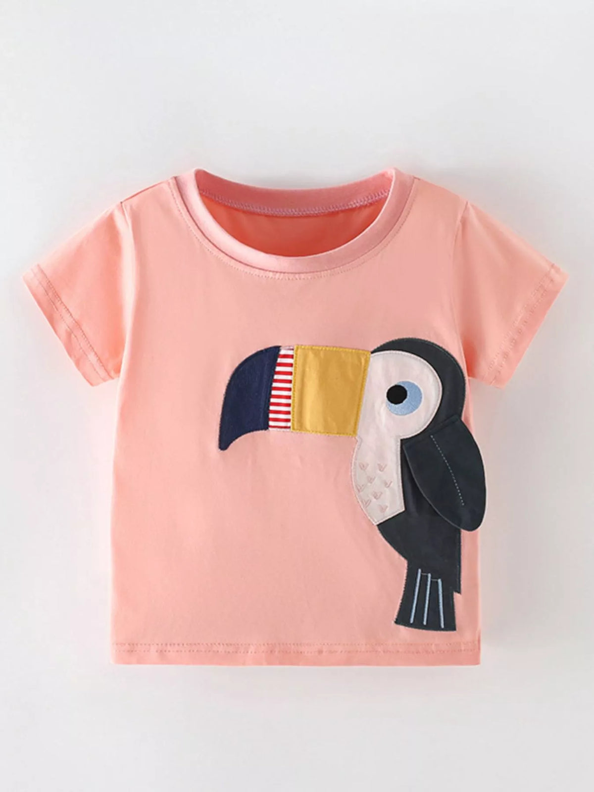 Coral toucan applique shirt — front