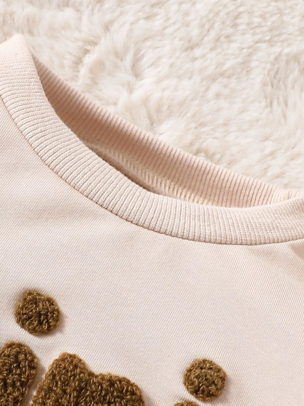 Cream ribbed round neckline