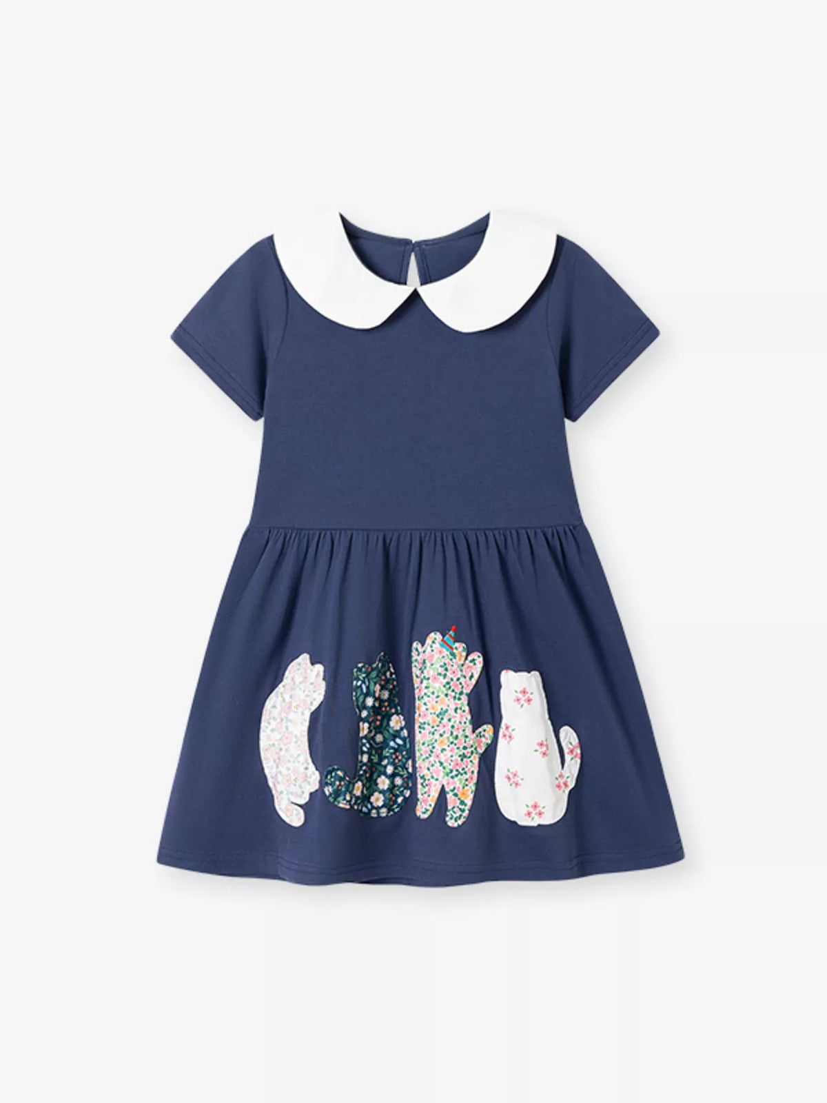 Navy cat-applique dress with a white Peter Pan collar laid flat