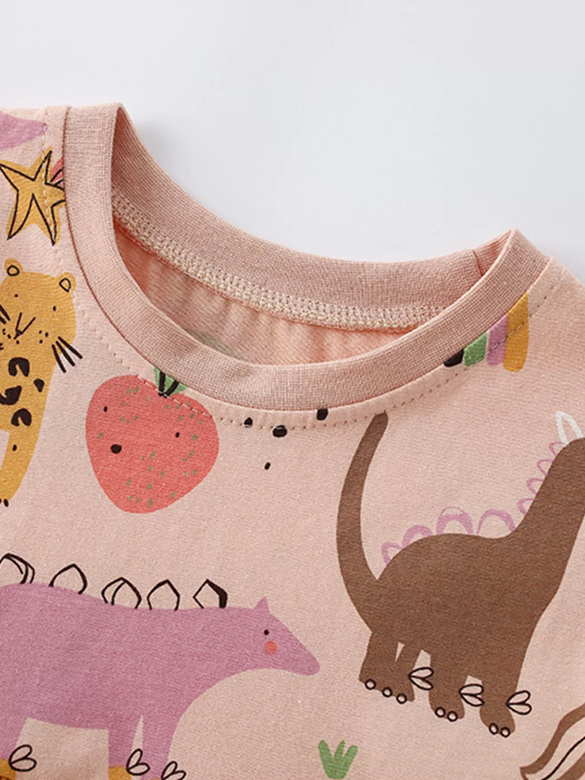 Peach dinosaur rainbow peplum top and leggings set — round neckline
