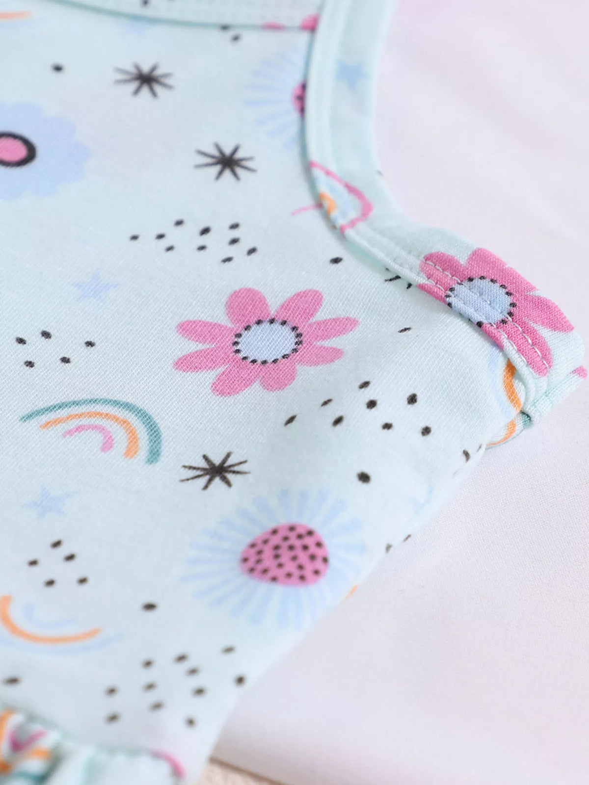 Thin floral shoulder strap and neckline