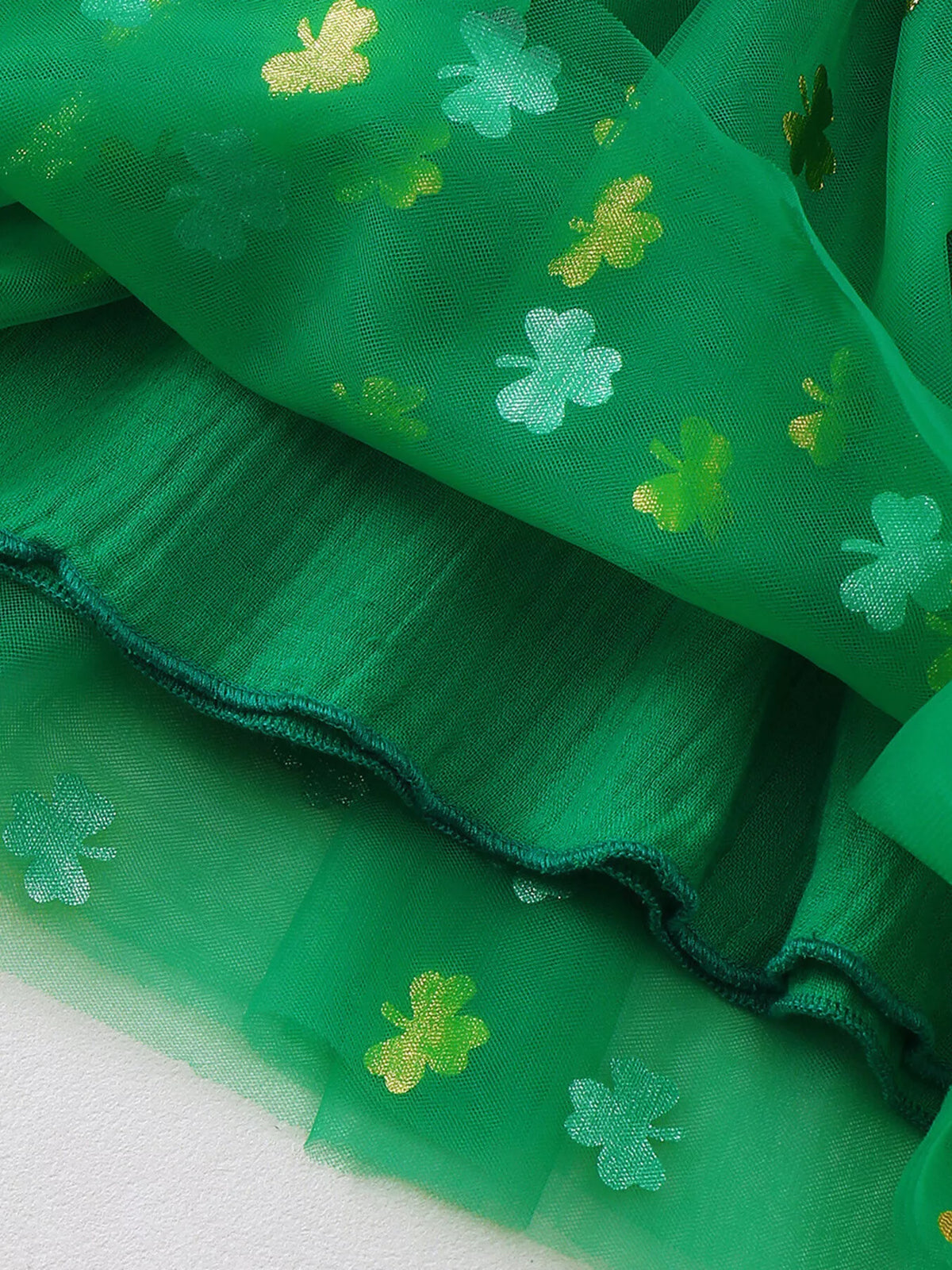 Green clover smocked tulle dress — tulle skirt layers and hem