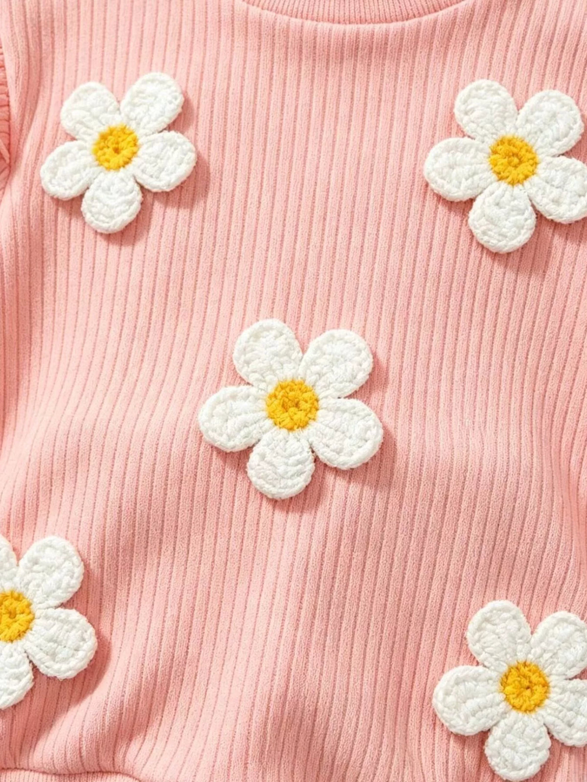 Raised white daisies with yellow centers