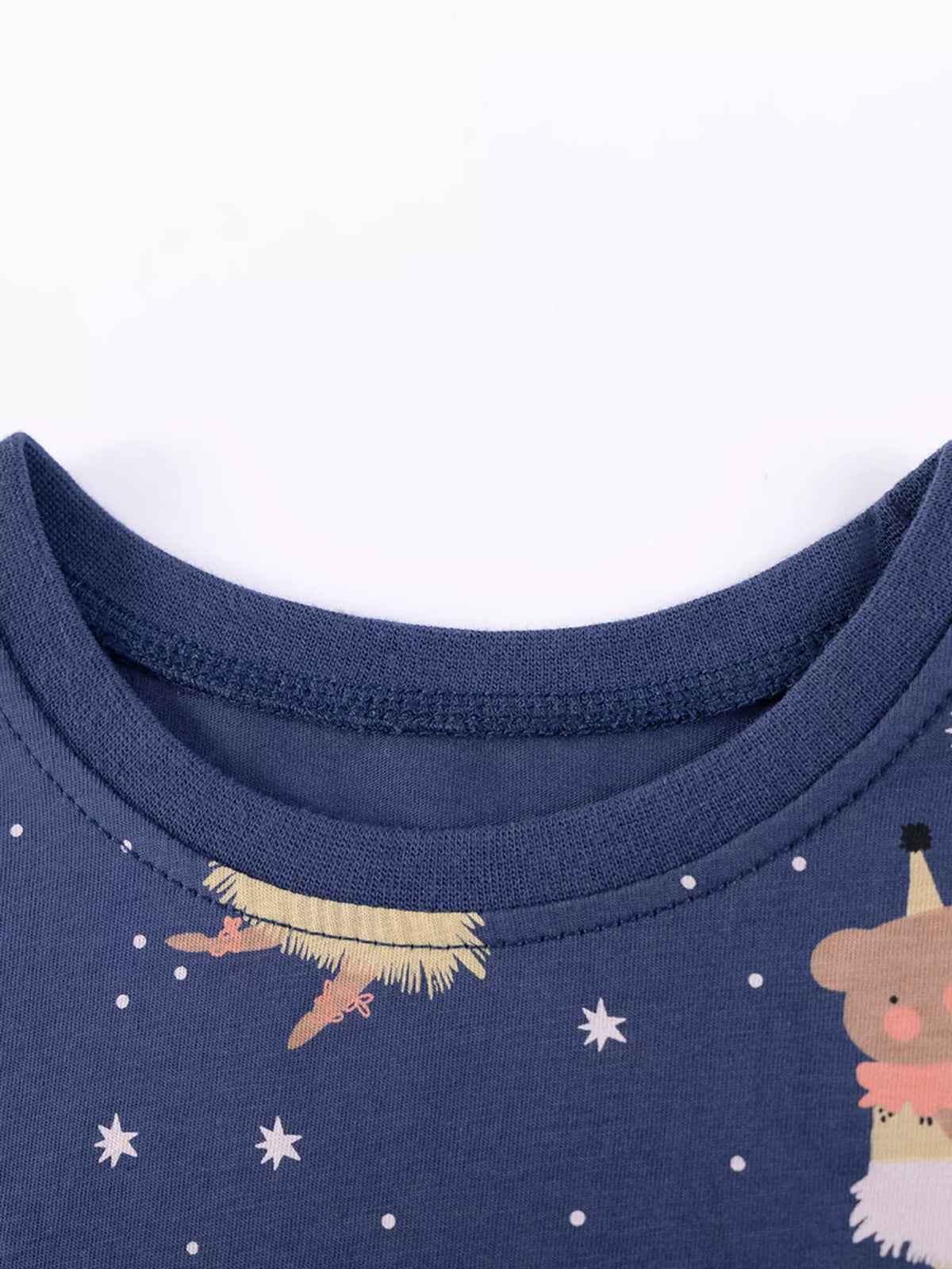 Navy round neckline and small illustrated motifs