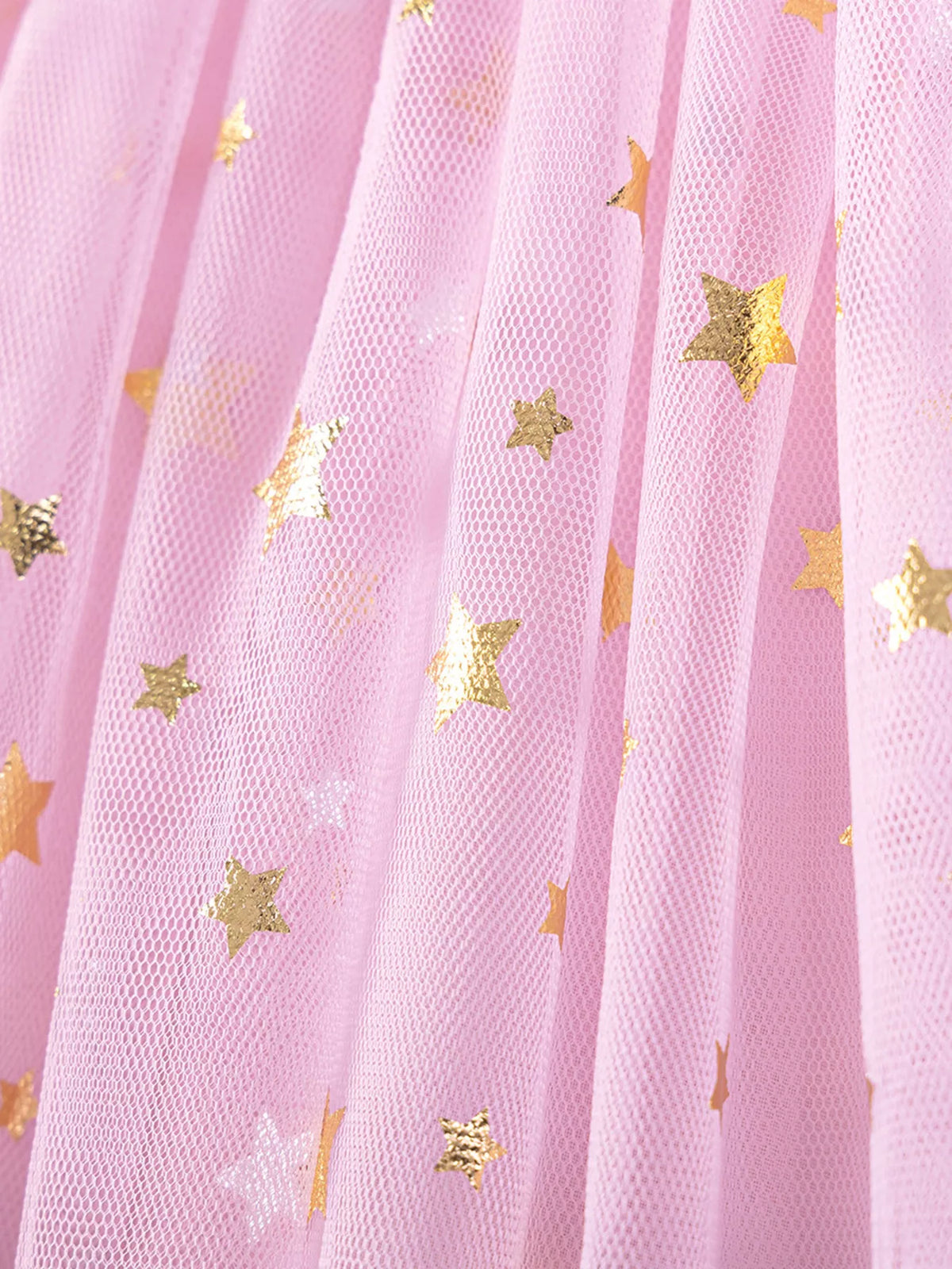 Gold stars scattered on pink tulle