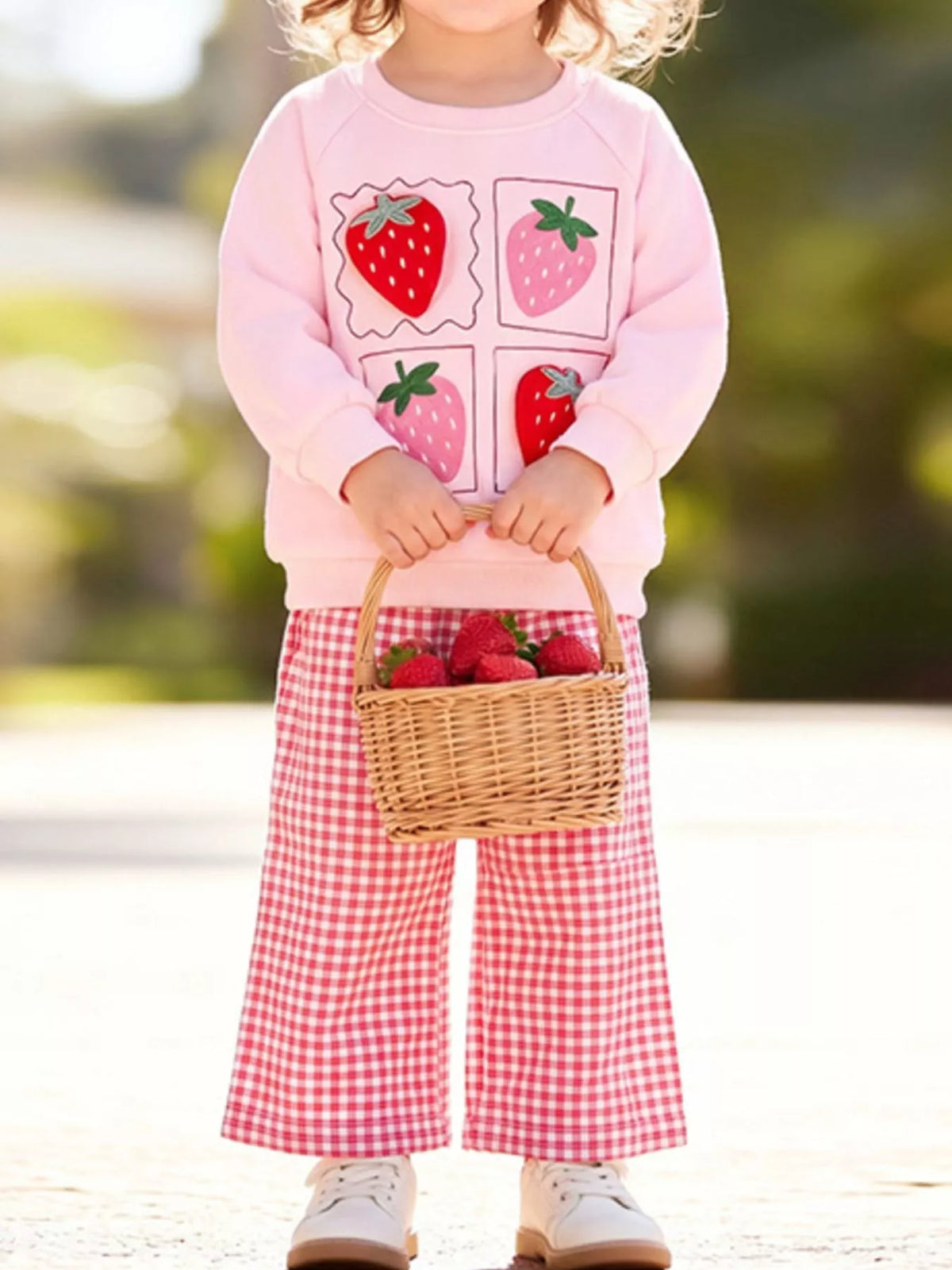 Outfit on a child holding a basket