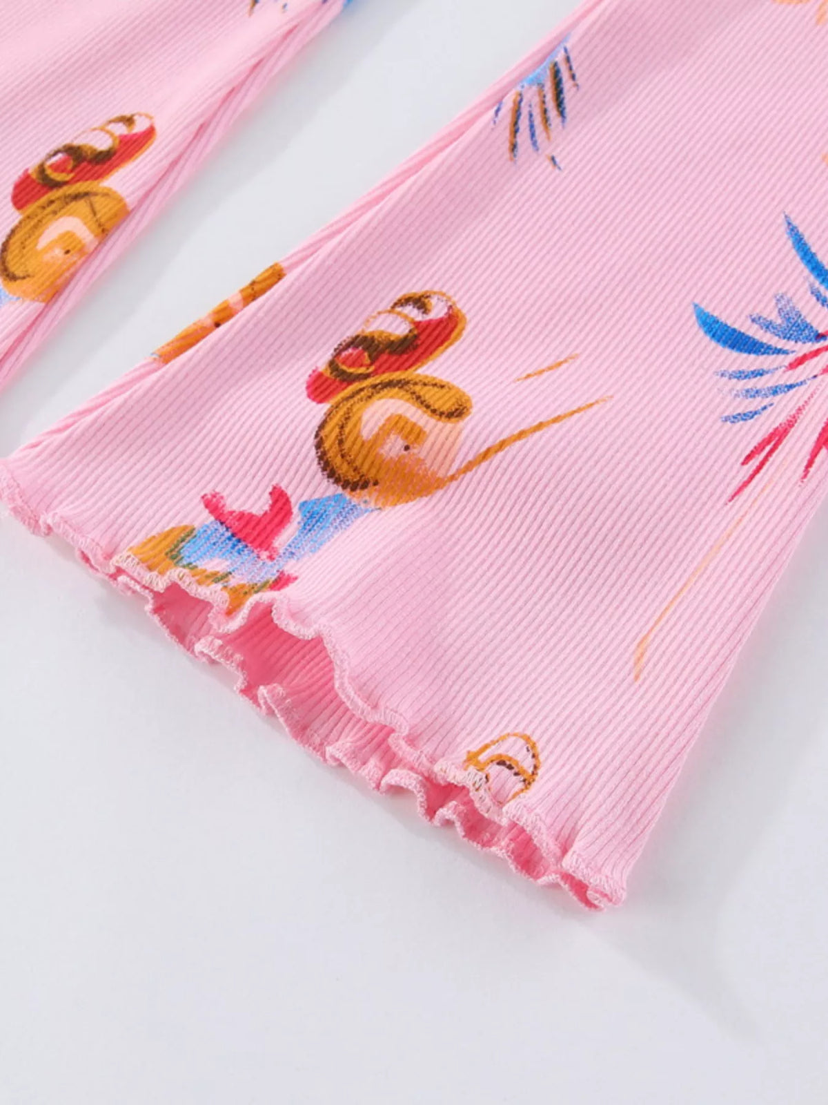 Fairy motifs on the flared leg hem