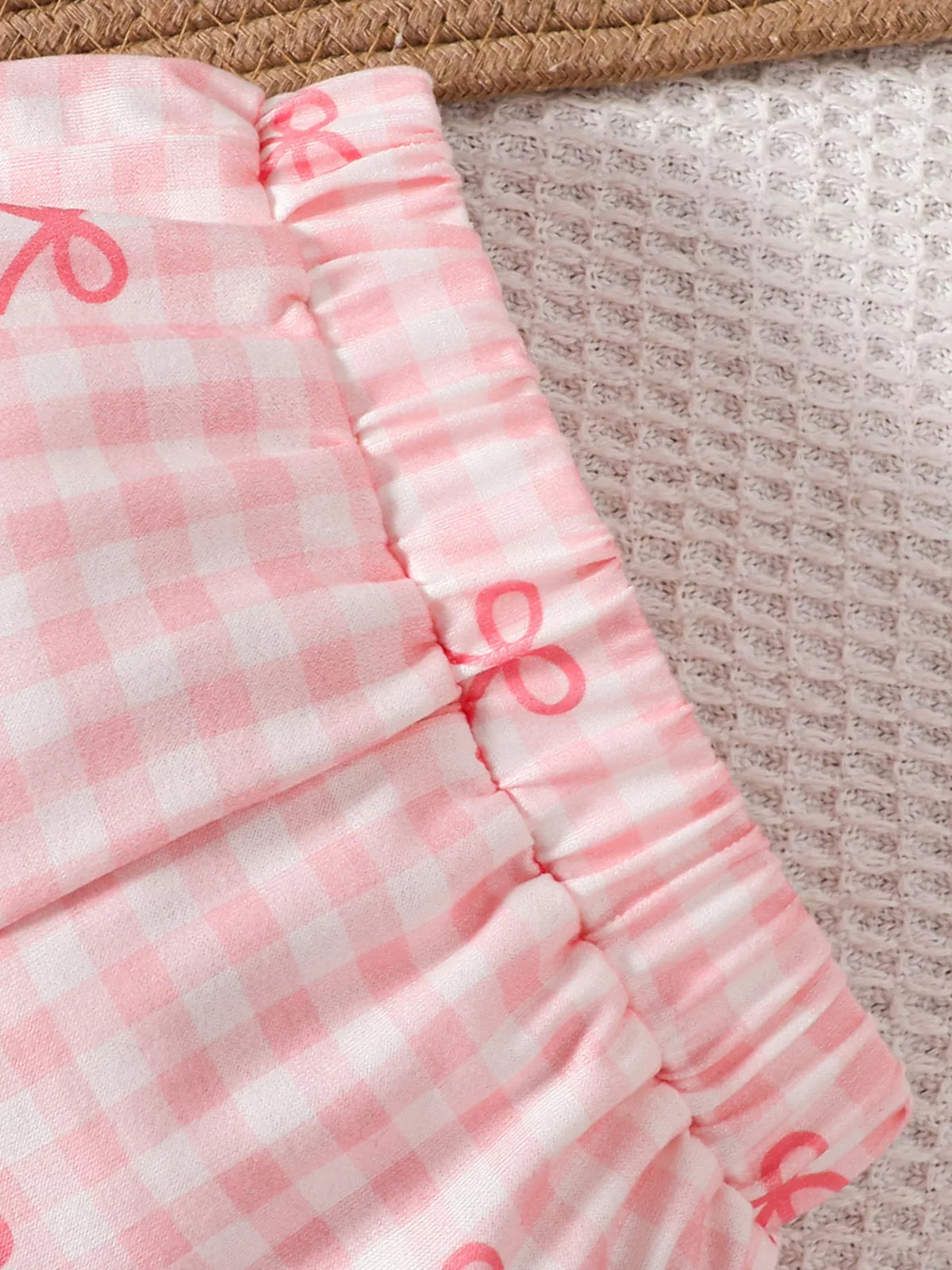 Elastic waistband on pink gingham pants
