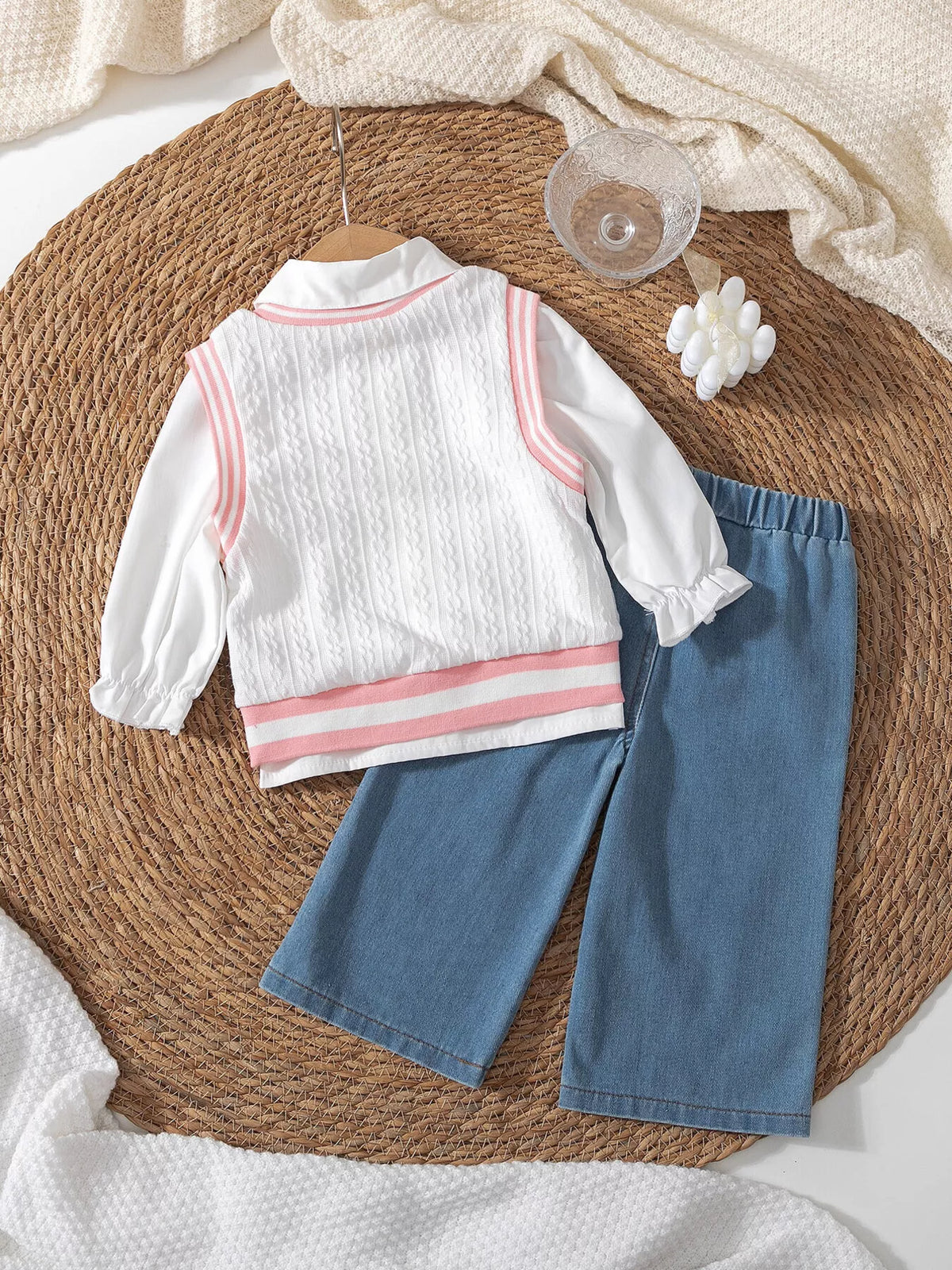 Back of the white collared top and jeans